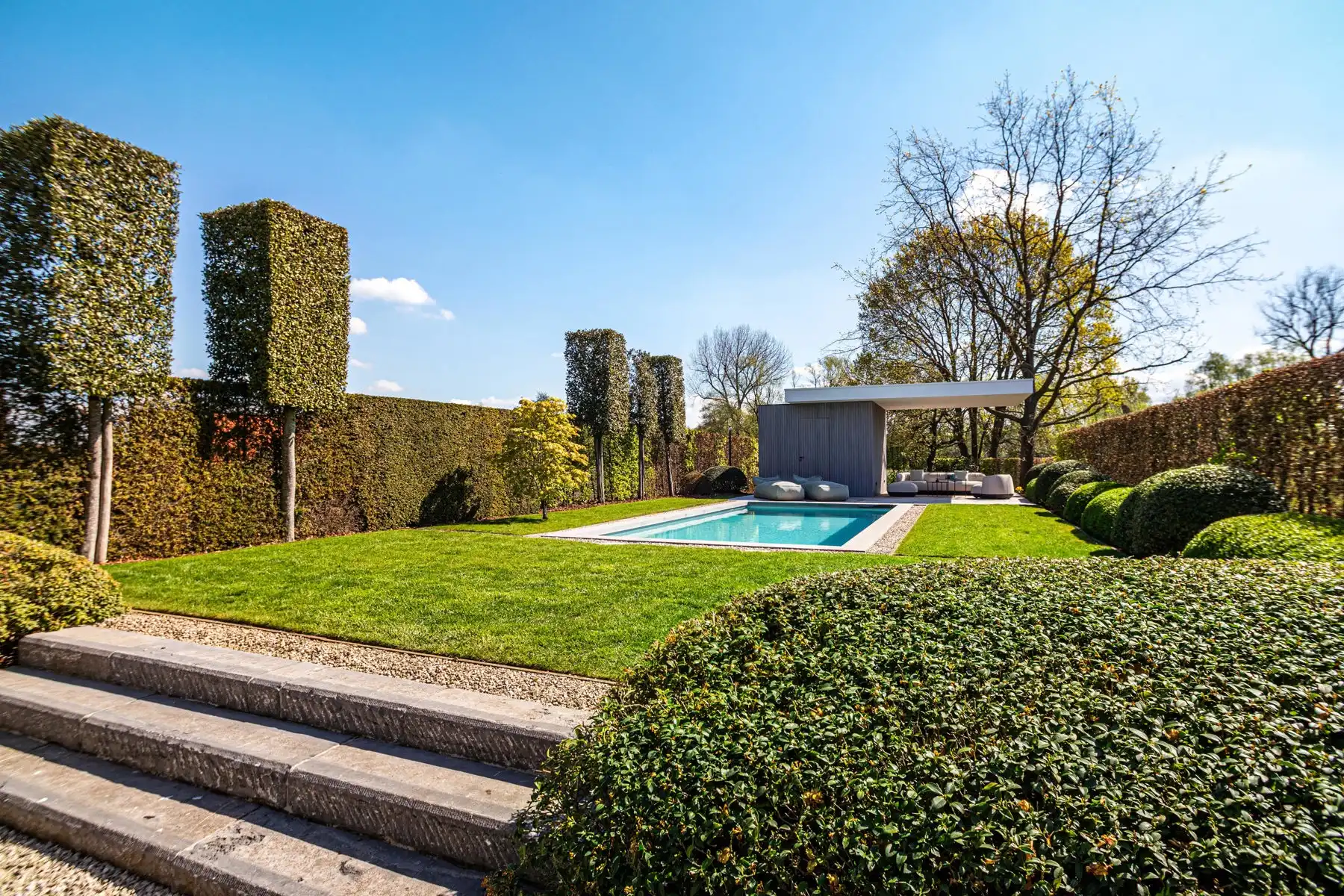 Exclusieve instapklare woning met zwembad en open groenzicht foto 6