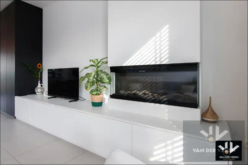 Knap ingericht, recent en lichtrijke woning met 3 ruime slpk en volledig omheinde tuin foto 2