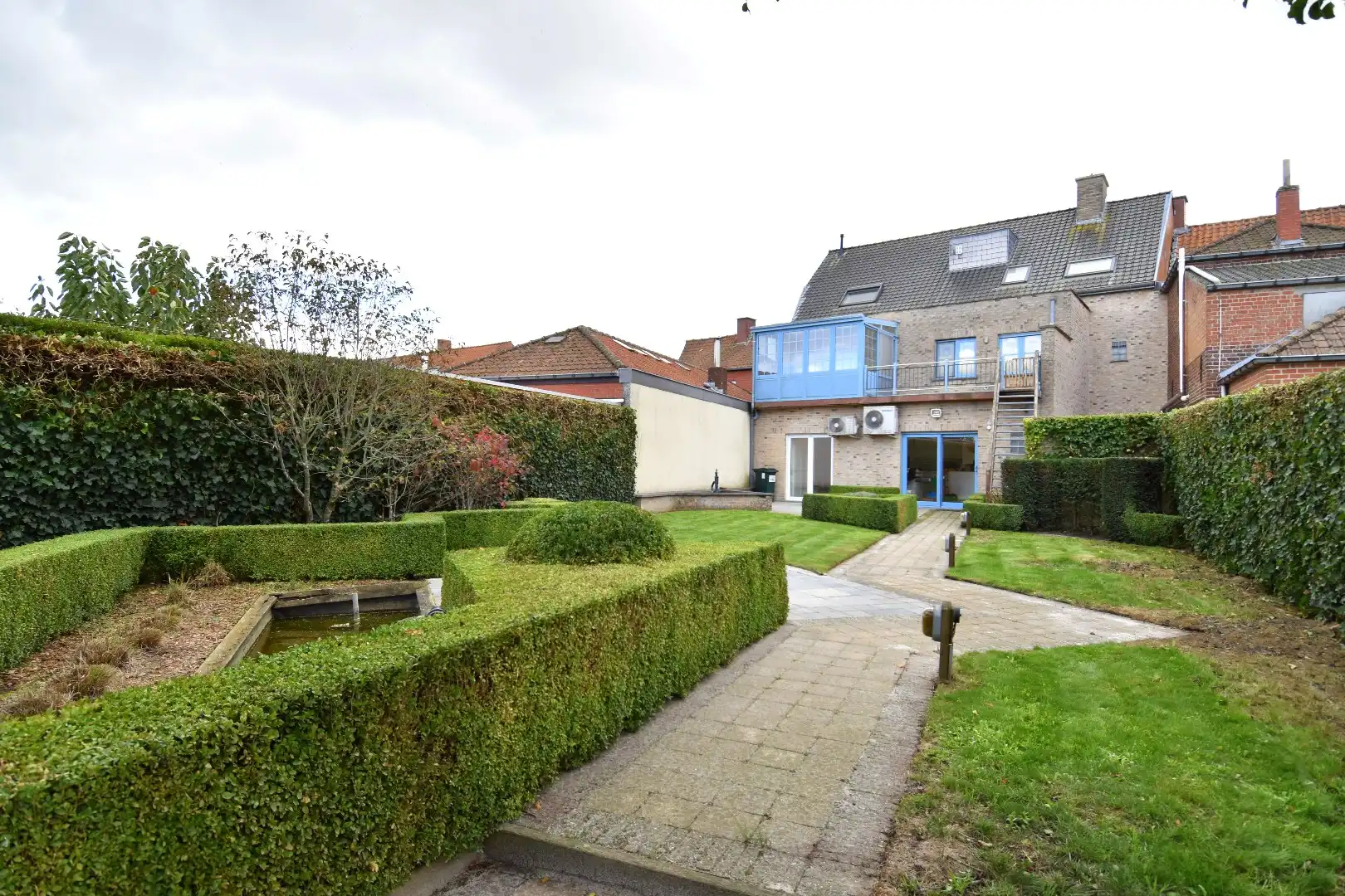 Statige woning met praktijkgedeelte (101 m²), 4 slaapkamers en zonnige tuin te koop in het straatbeeld van Bellegem foto 28