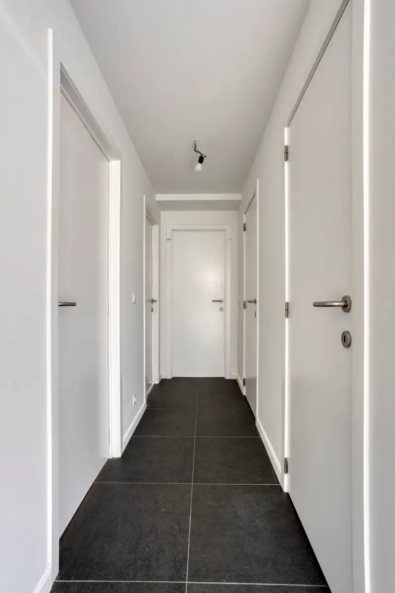 Leemans Immobiliën biedt u dit energiezuinige appartement aan met een adembenemend uitzicht over Brussel. foto 10