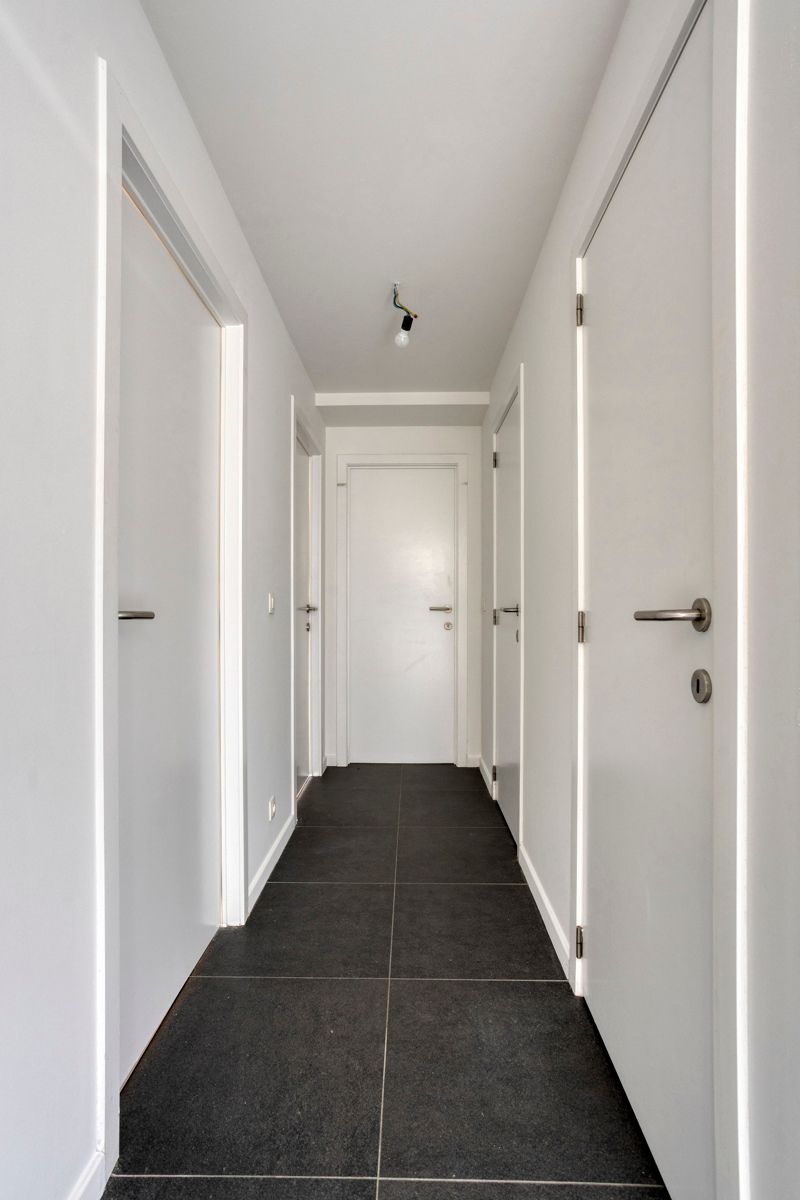 Leemans Immobiliën biedt u dit energiezuinige appartement aan met een adembenemend uitzicht over Brussel. foto 10