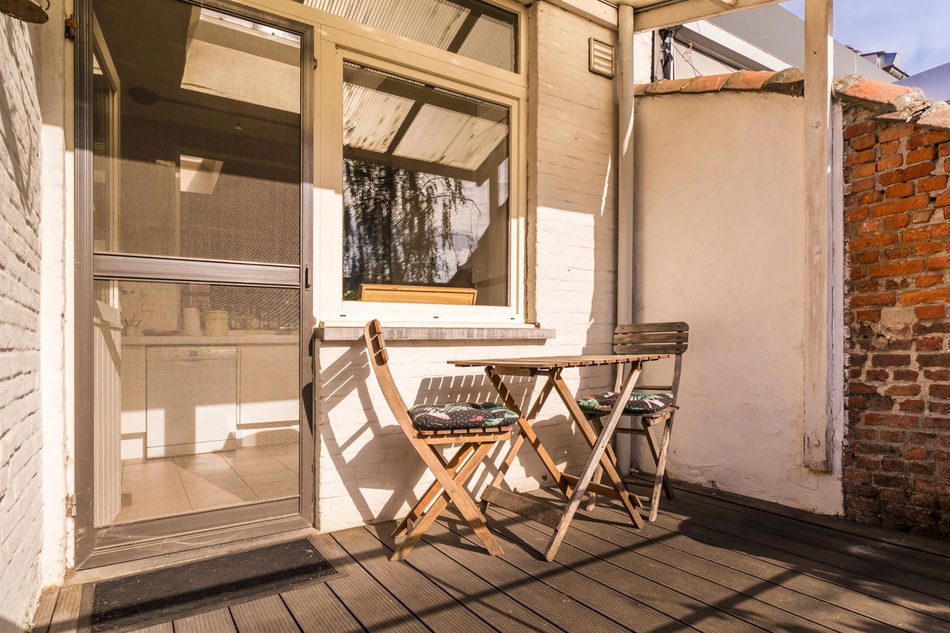 Karaktervolle woning met 3 slpks en tuin met uniek buitenhuis foto 11