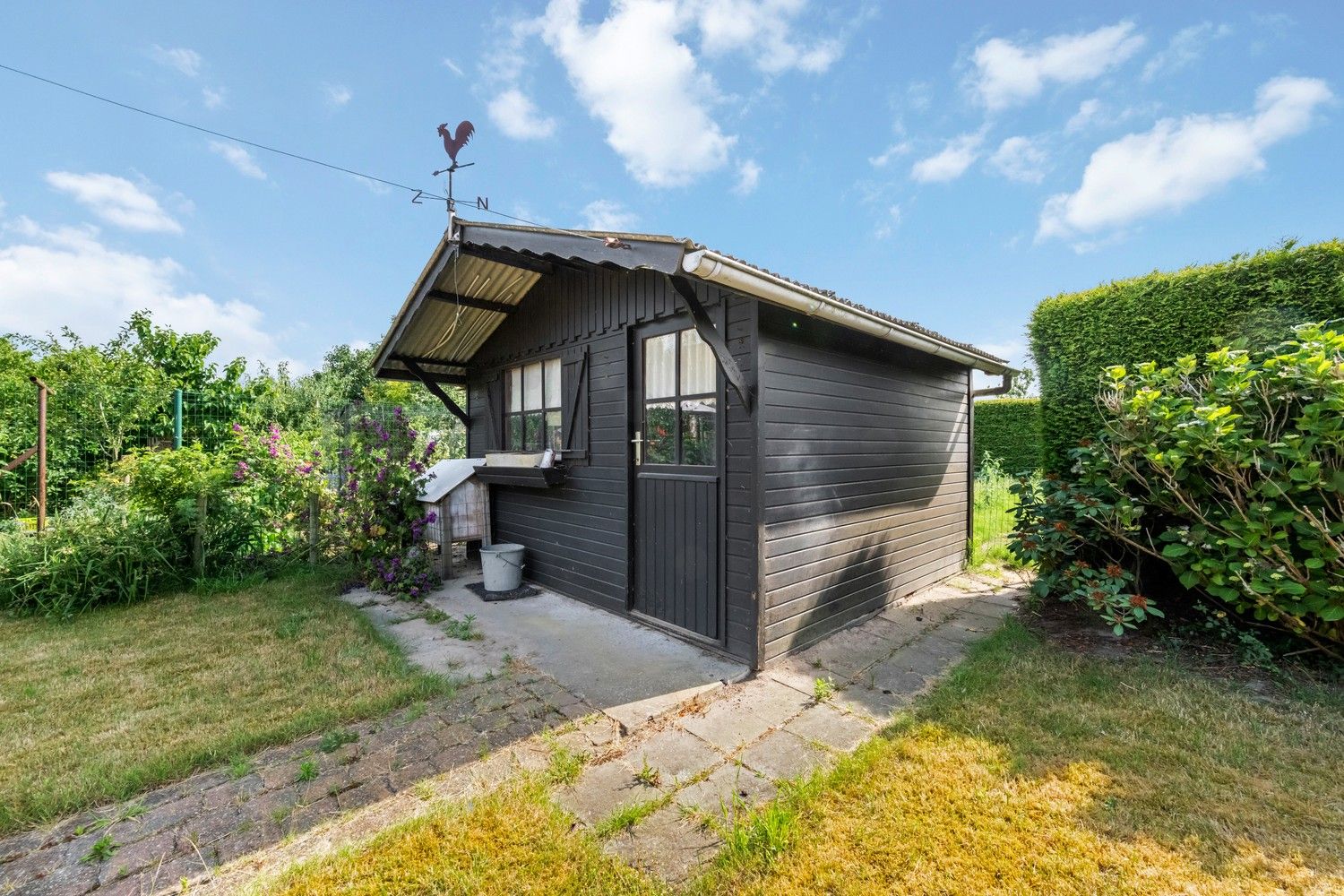 Rijwoning met potentieel, zonnige tuin, garage en uitbreidingsmogelijkheden te koop in Ruddervoorde foto 23