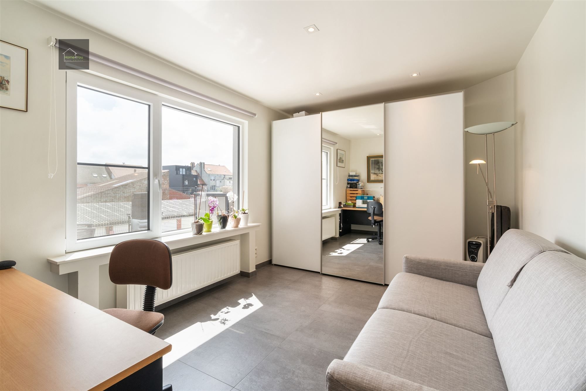 Ruim instapklaar appartement met groot Zuid-gericht terras! foto 15