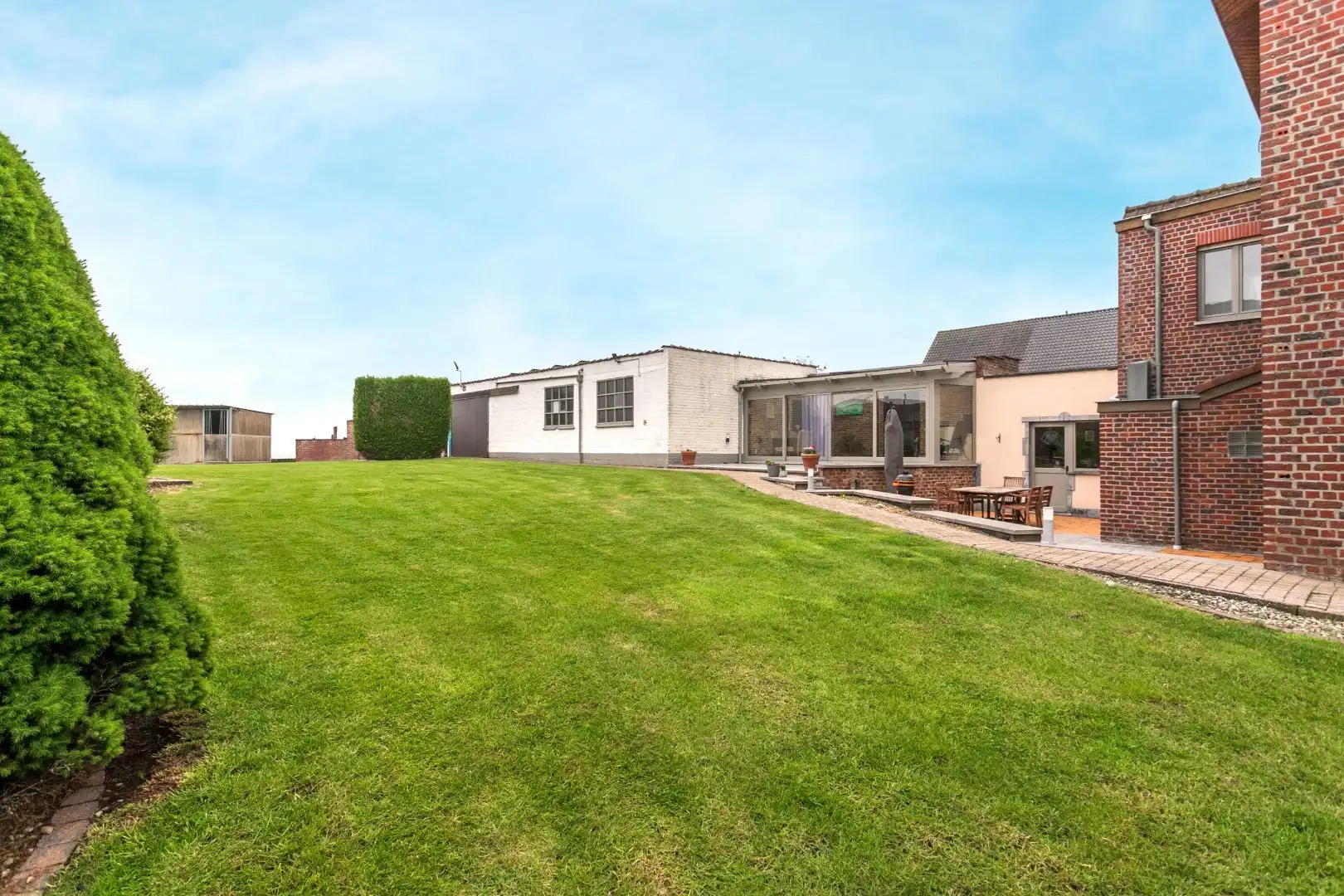 Ruime woning met naastgelegen bouwgrond en loods foto 18