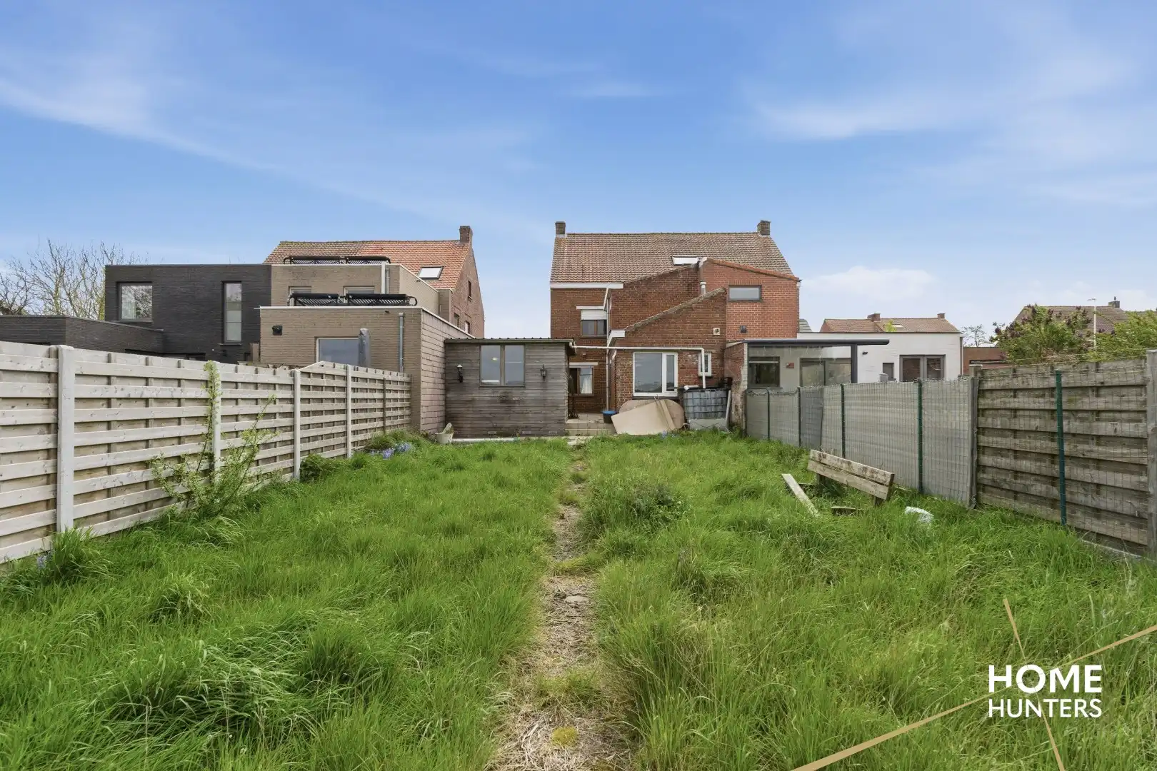 Halfopen te renoveren woning met 4 slaapkamers, ruime tuin en garage op gunstige locatie te Ieper foto 25