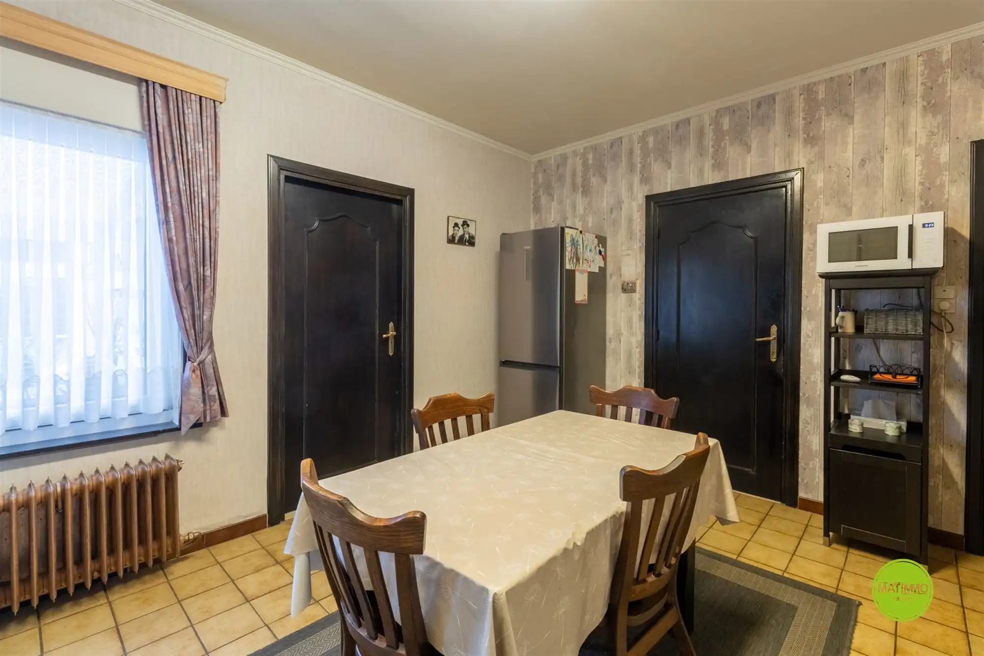 Halfopen woning met veel potentieel in het centrum van Bree foto 11