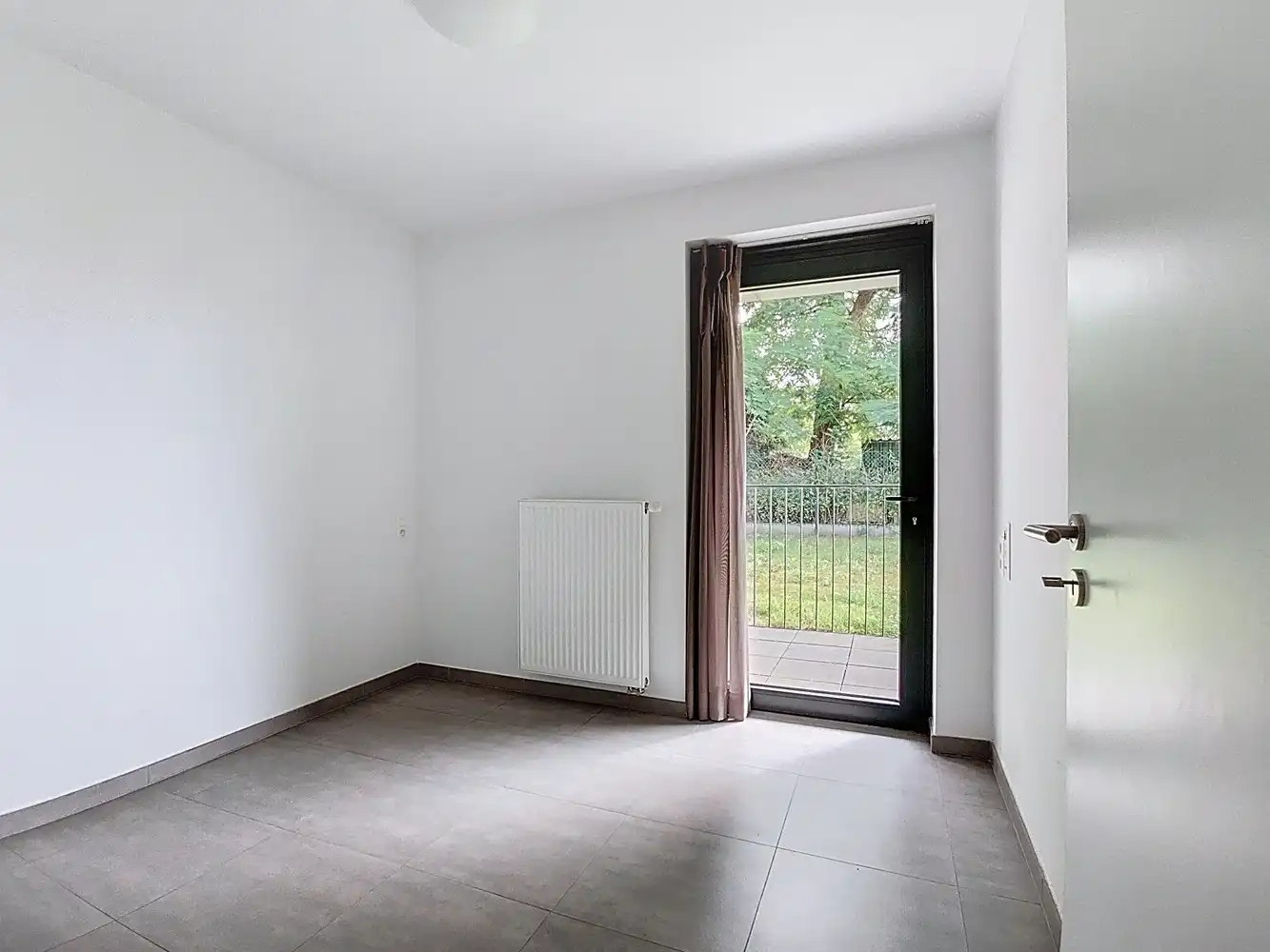 Ruim gelijkvloers appartement voor senioren met zicht op pastorietuin foto 12