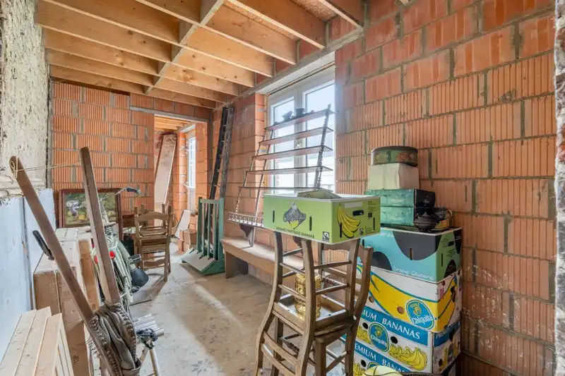 Handelsruimte met woonappartement in het centrum van Wommersom foto 32