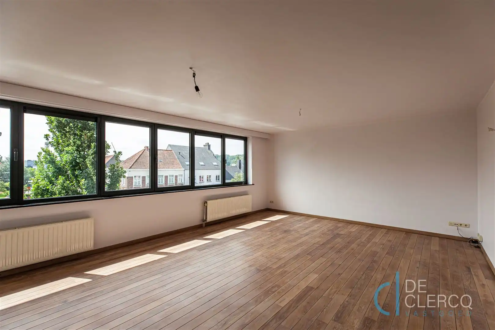 Prachtig ruim appartement te huur in hartje Lochristi! foto 3