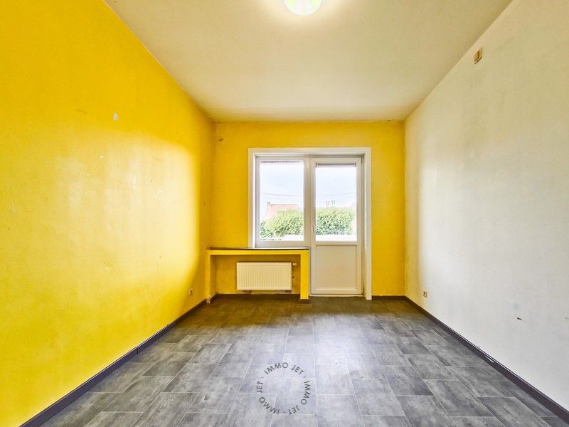 Lichtrijk twee-slaapkamer appartement inclusief garage in hartje Beveren foto 6