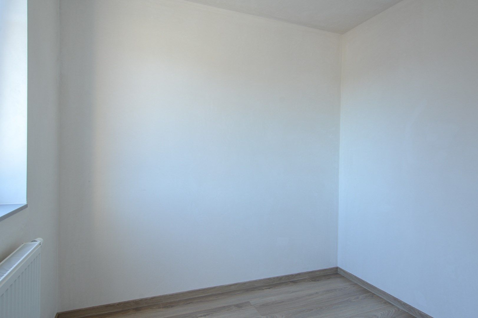 Halfopen nieuwbouwwoning te huur in Roksem.  foto 13