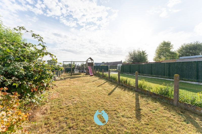 Rustig gelegen starterswoning met grote tuin foto 17