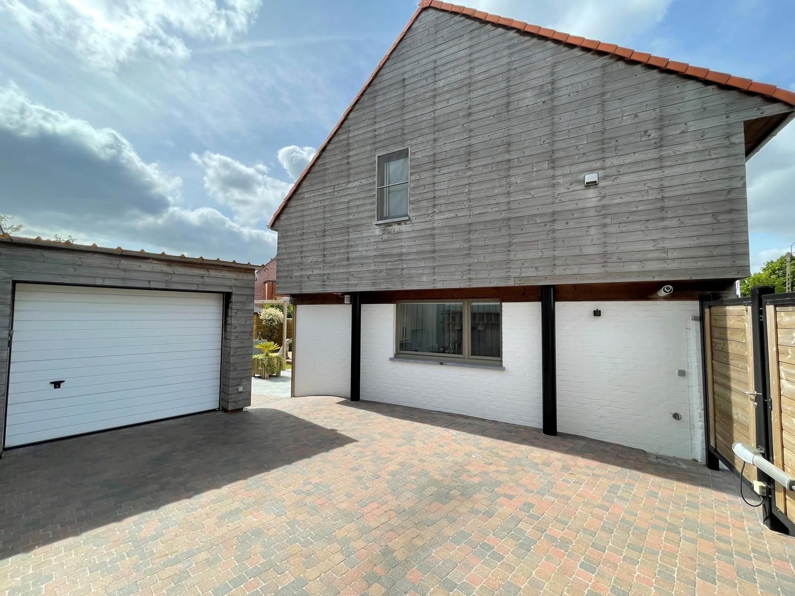 Instapklare woning met oprit, garage en zuidgerichte tuin foto 18