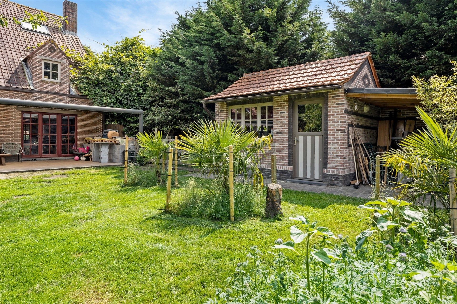 Ruim opgezette, landelijke woning met aangename tuin, 6 slaapkamers en een ingerichte woonstudio op de 2e verdieping foto 30
