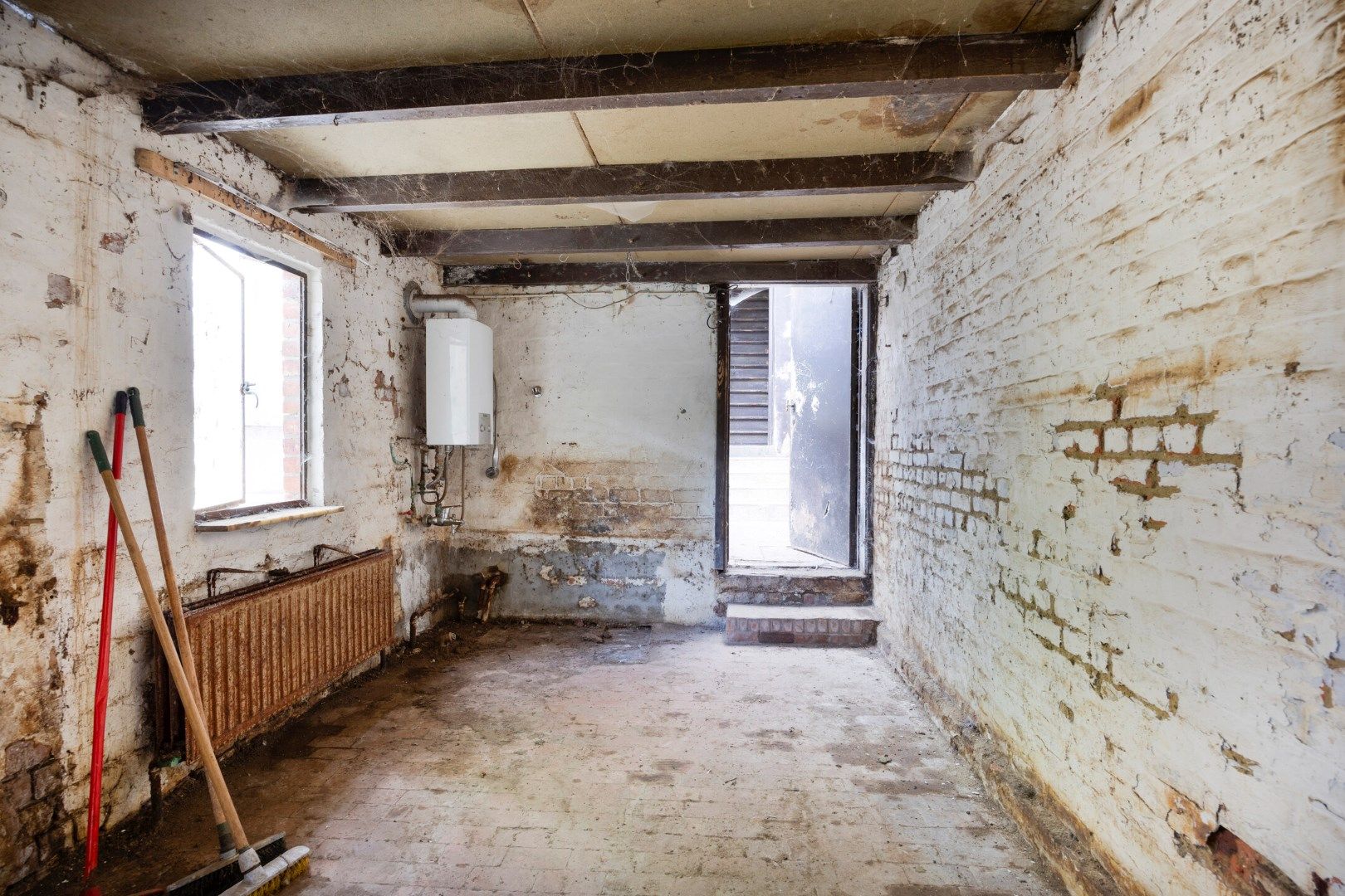 Te renoveren halfopen bebouwing met 3 slaapkamers en ruime tuin in hartje Kessel-Lo  foto 9