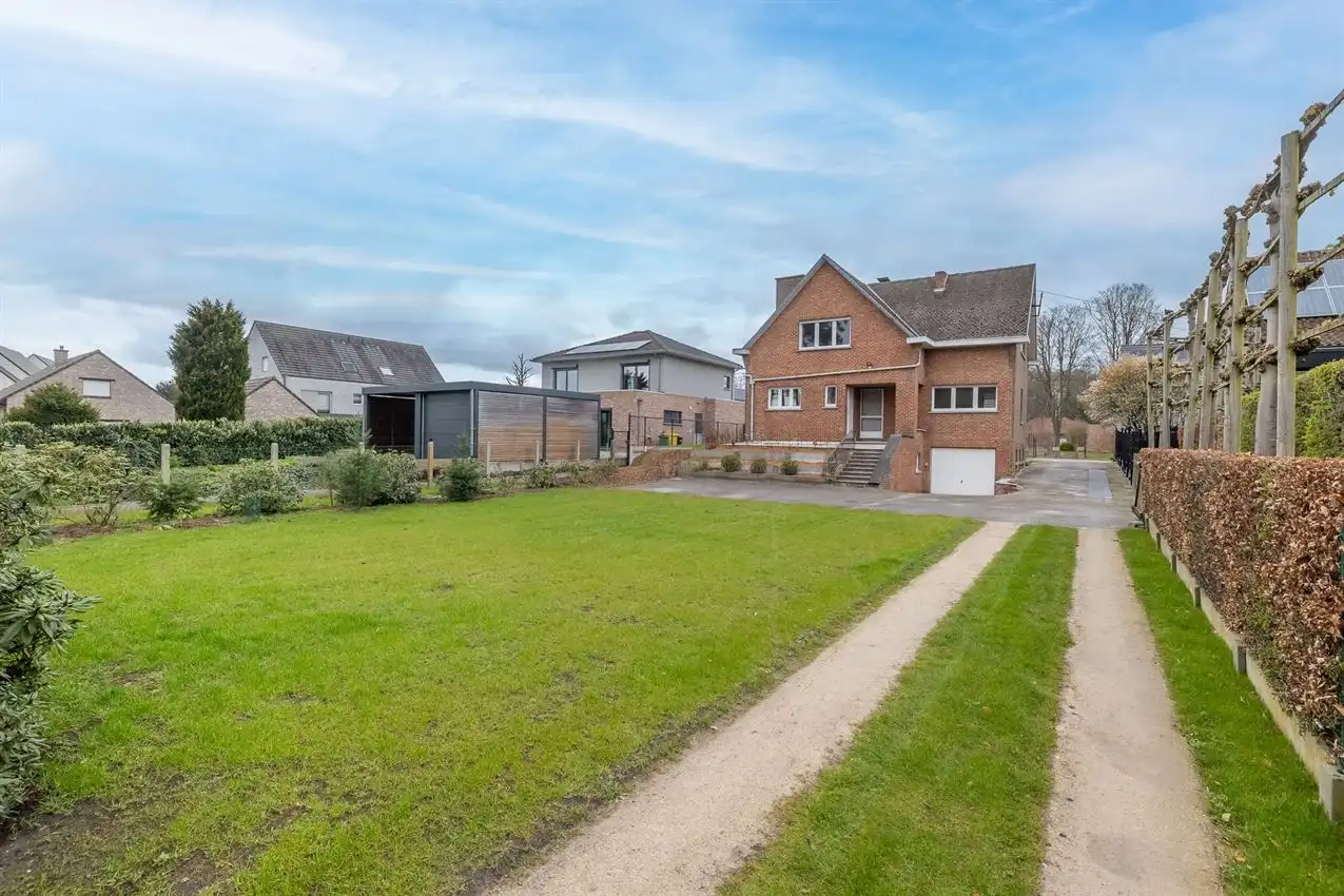 Gusting gelegen woning met 3 slpk, garage en tuin foto 40