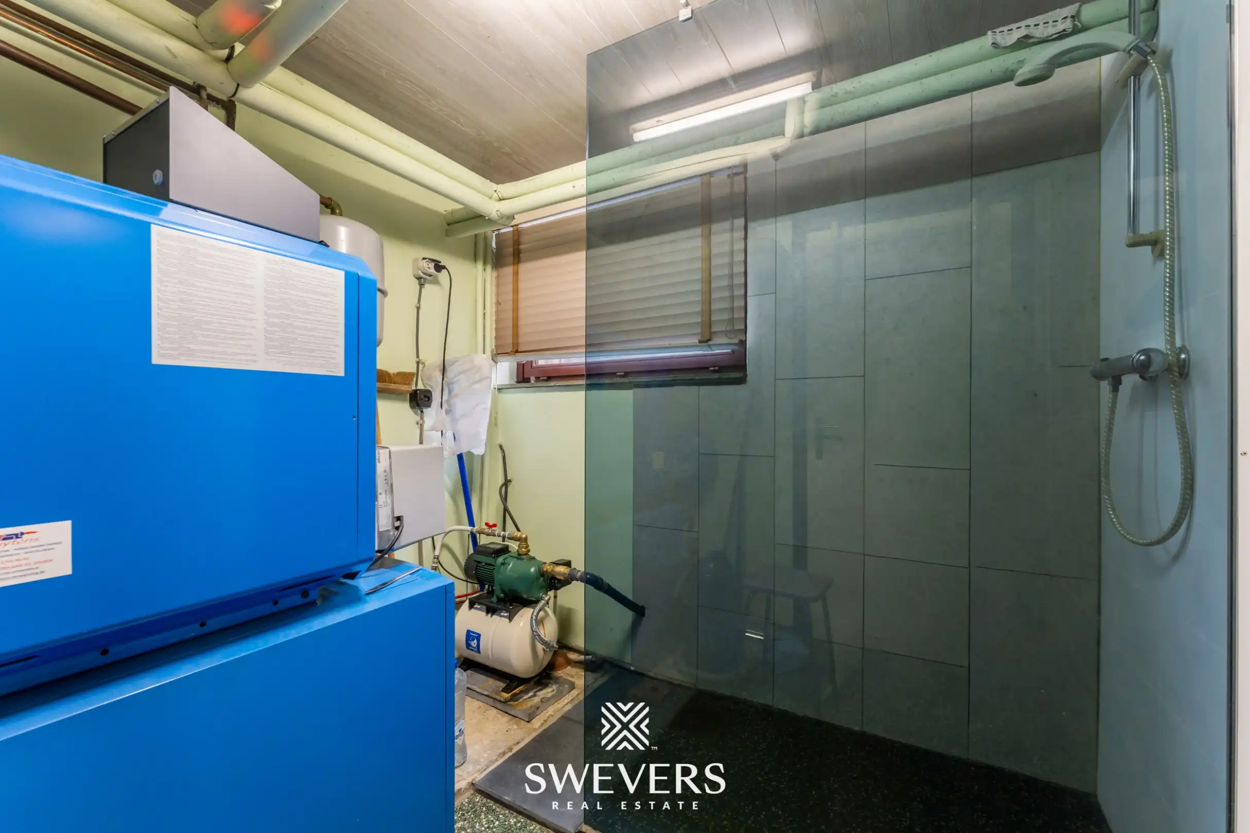 Open bebouwing met drie slaapkamers op uitzonderlijk groot perceel van 1.897 m² foto 21