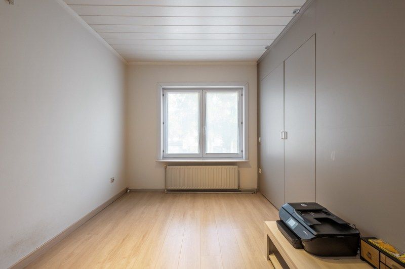 Instapklare bel-etagewoning met garage, tuin en veel potentieel foto 13
