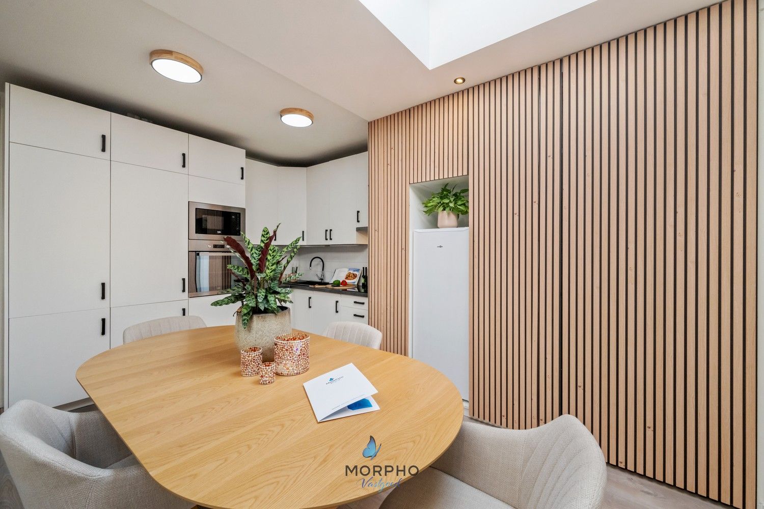 Instapklaar gelijkvloers appartement met 2 slpks, zonneterras en autostaanplaats. foto 2
