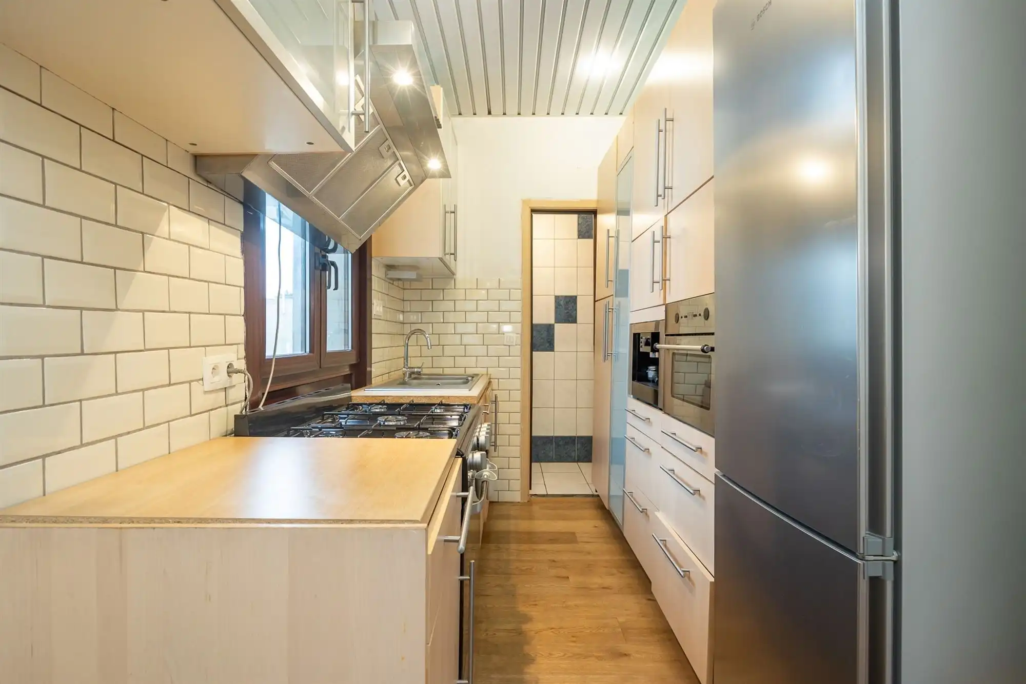 Instapklare woning met 2 à 3 slaapkamers en stadskoer foto 14