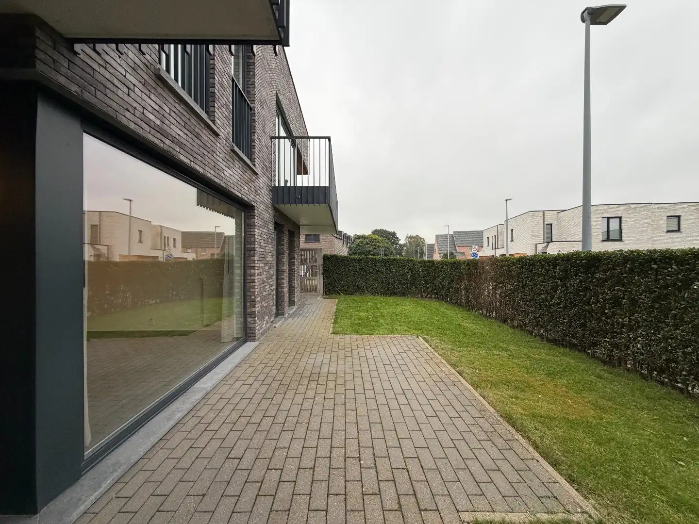 Gelijkvloers appartement met tuin en garage! foto 19