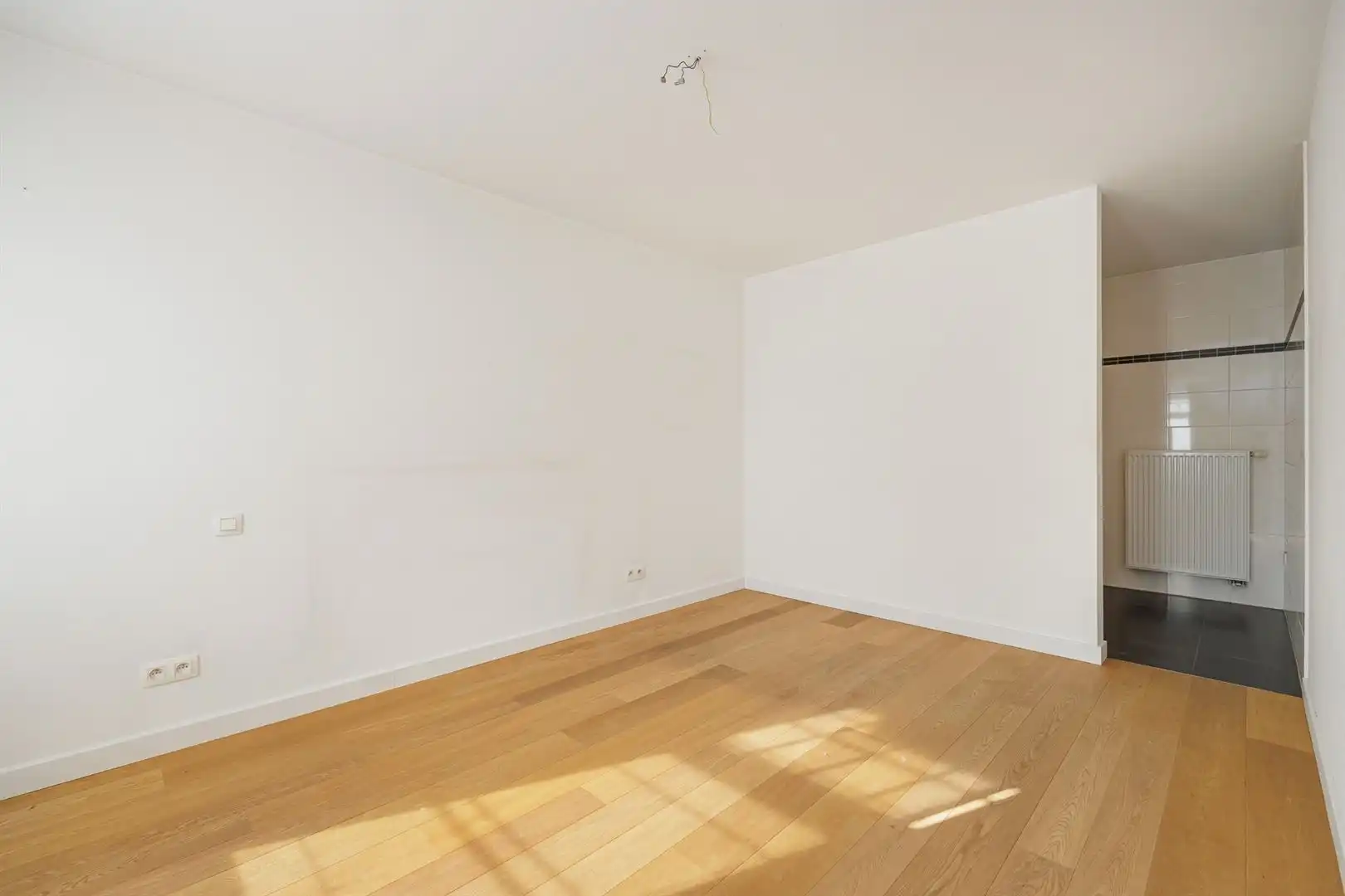 Gelijkvloers appartement met 2 slaapkamers en garage! foto 12