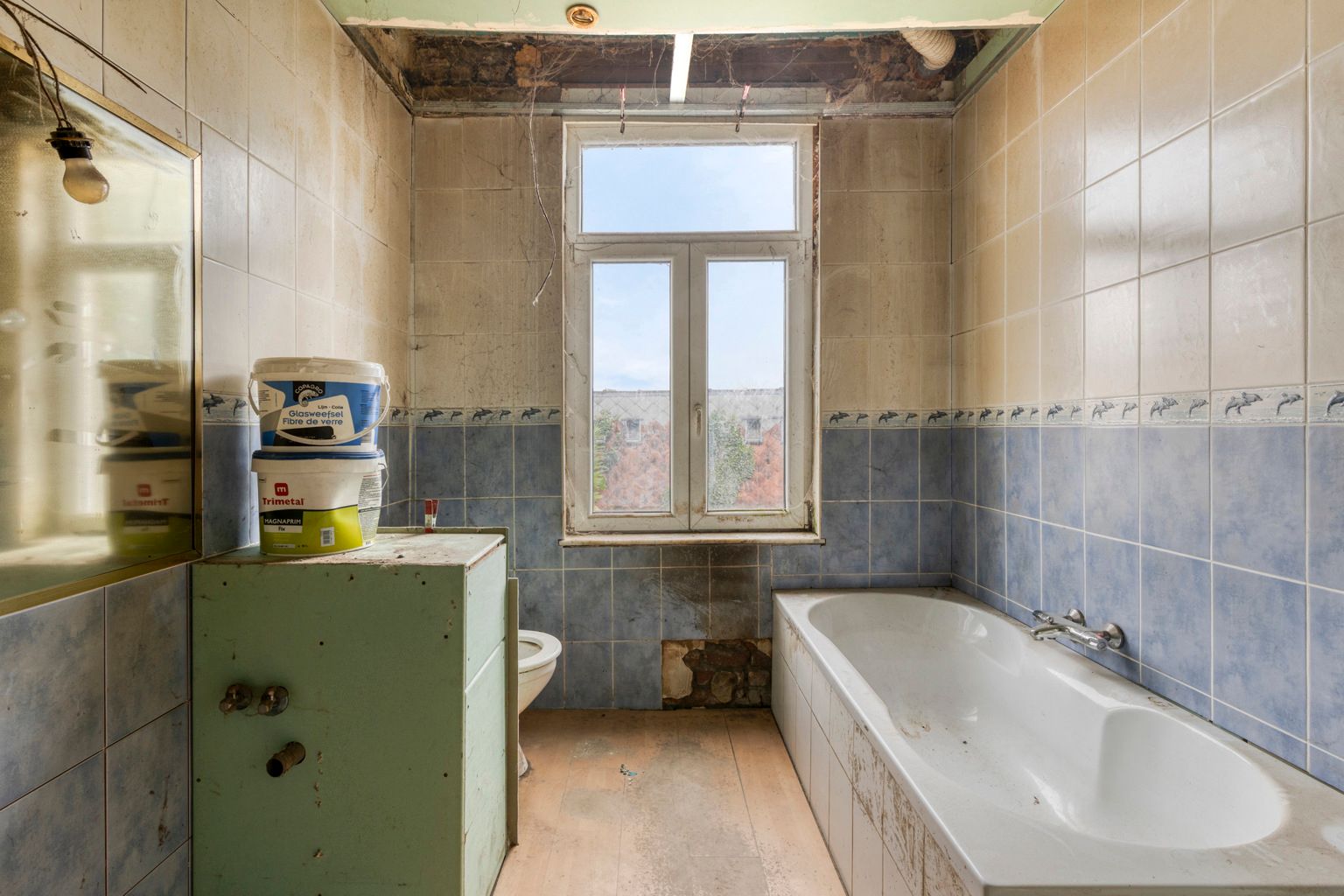 immoDAVID stelt voor: totaal te renoveren woning met tuin foto 14