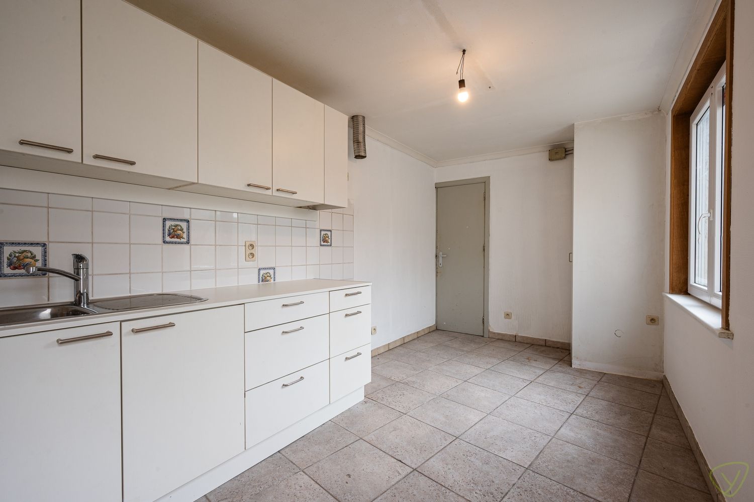 Te renoveren starterswoning met een verrassende tuin op een boogscheut van het centrum foto 7