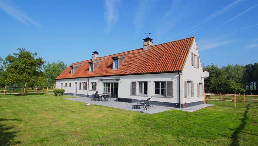 Hoeve in zeer goede staat op 1,22 Ha grond en stallen voor paarden foto 4