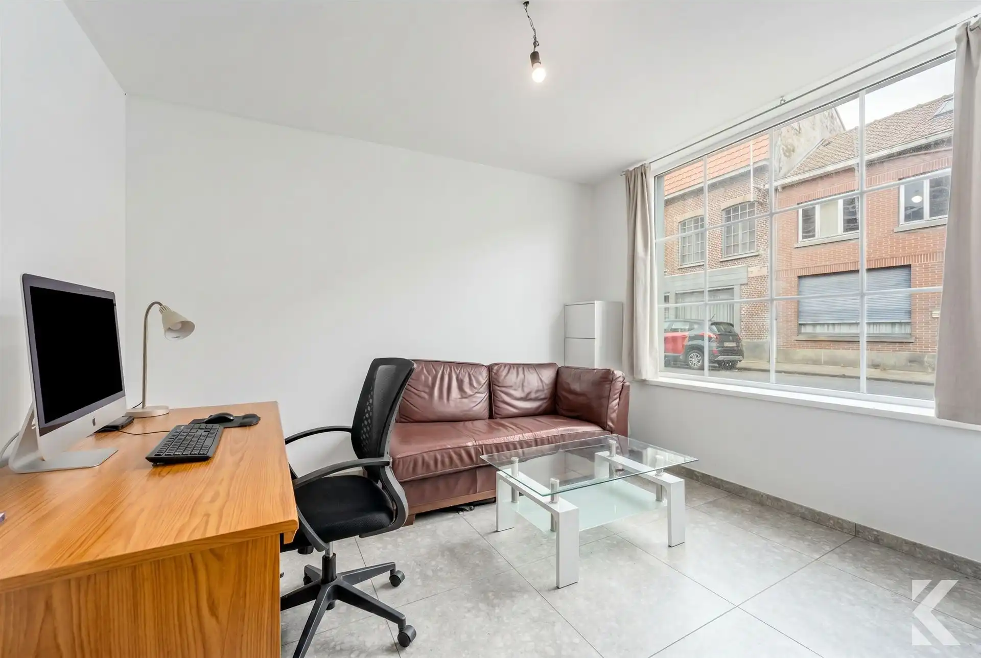 Volledig gerenoveerde woning met 4 slaapkamers en tuin. foto 2