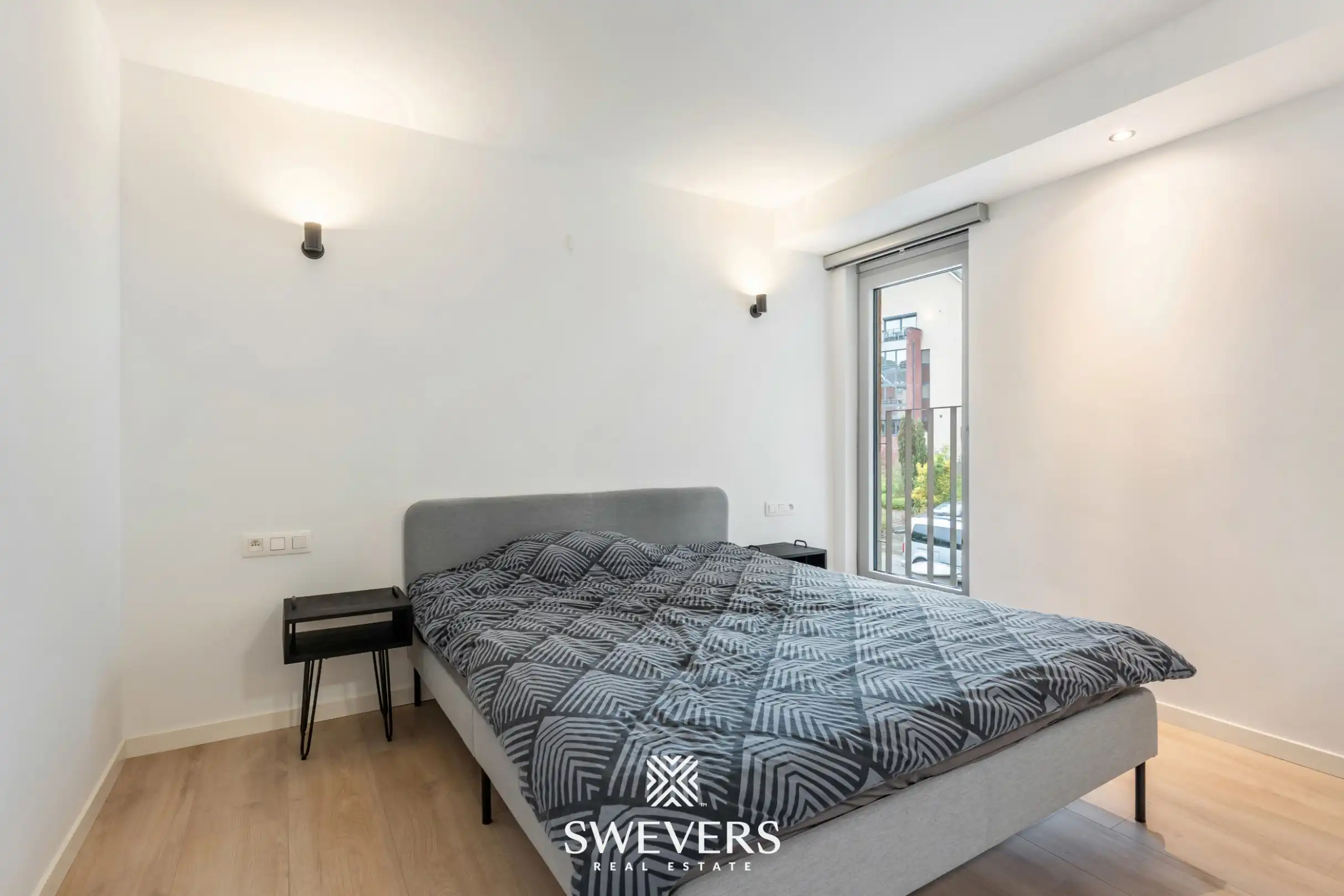 Modern en instapklaar appartement in hartje Genk met uitstekende investeringsopportuniteit foto 11