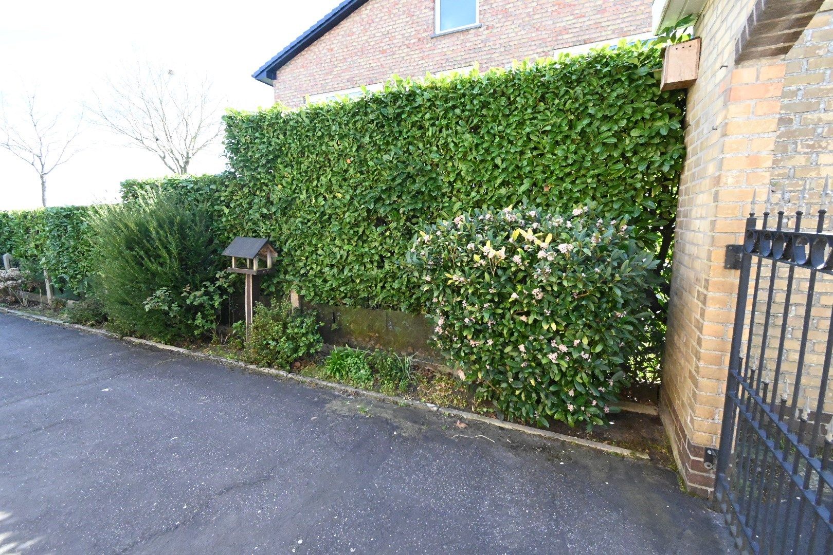 Halfopen bebouwing met garage en tuin foto 23