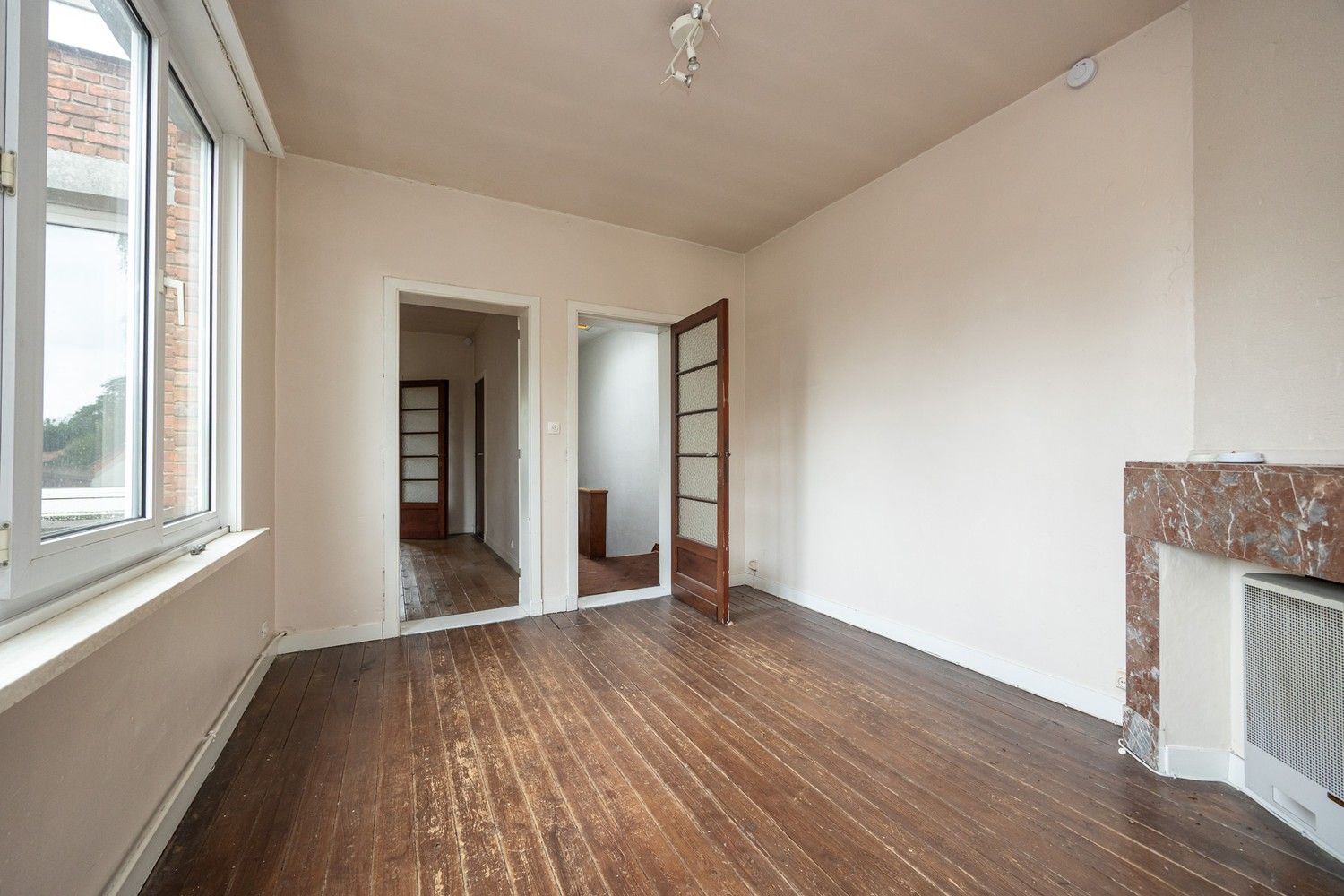 Te renoveren opbrengsteigendom met 3 éénslaapkamerappartementen nabij het Boekenbergpark foto 19