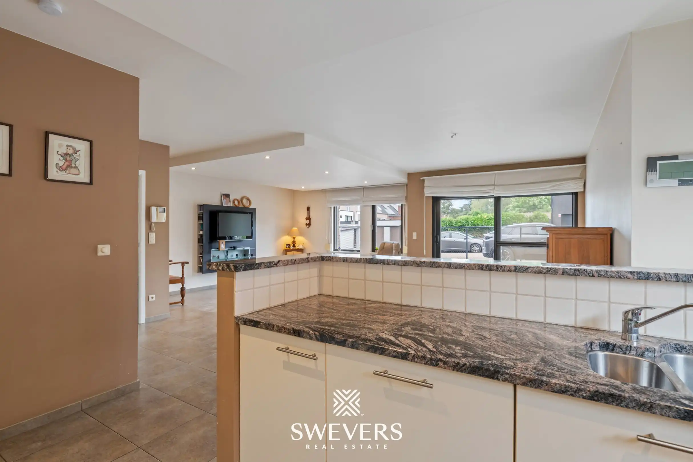 Ruim gelijkvloers appartement met tuin en ondergrondse autostaanplaats foto 11