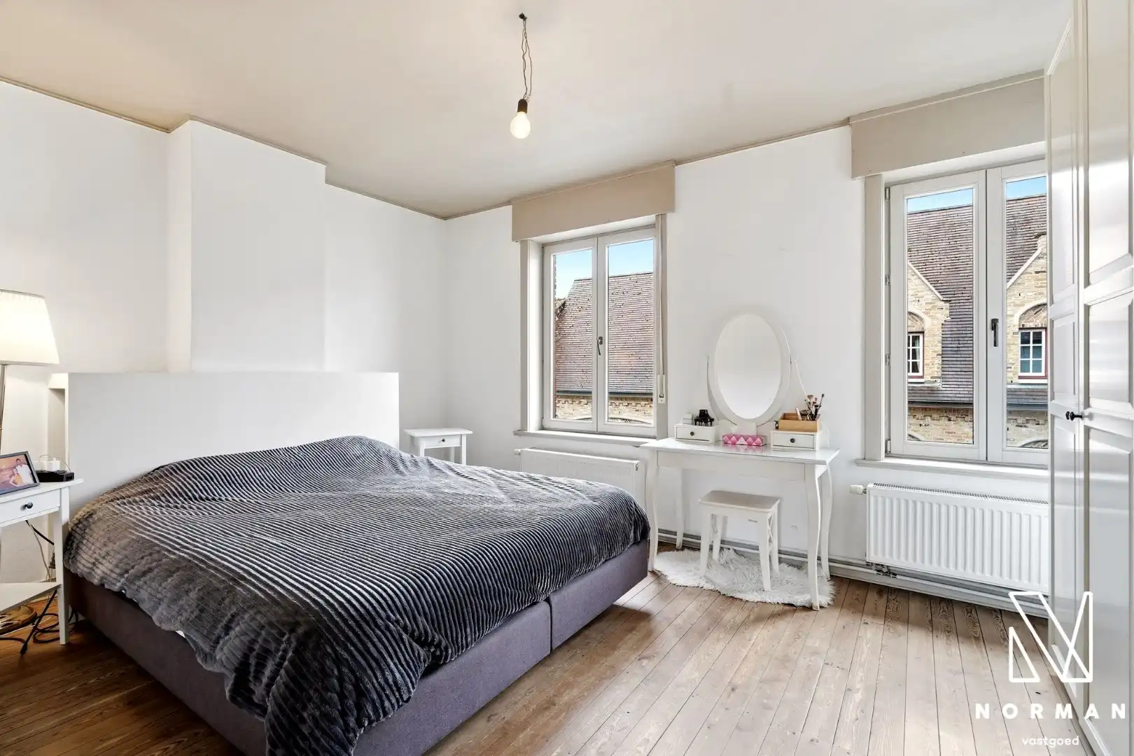 Instapklare woning met 3 slaapkamers en tuin te koop in centrum Kuurne! foto 8
