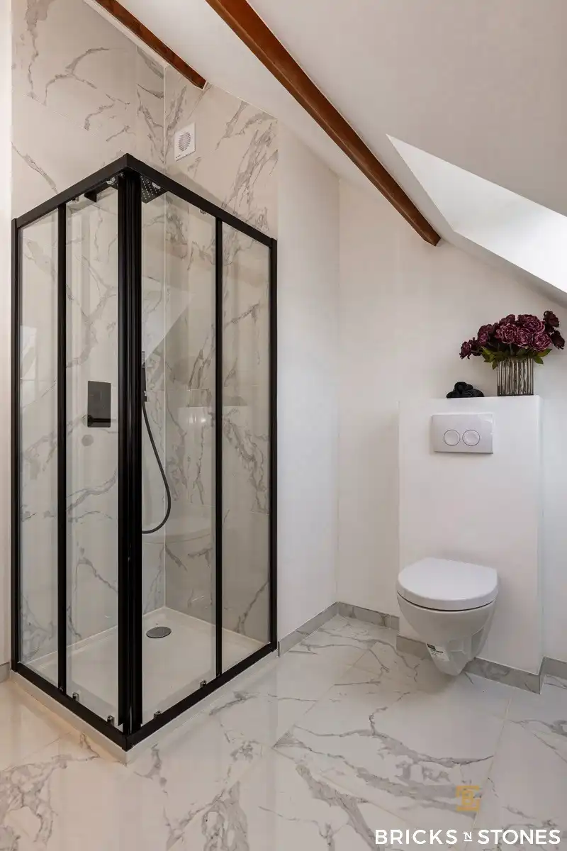 Zeer ruime halfopen bebouwing met praktrijkruimte en prachtige tuin foto 18