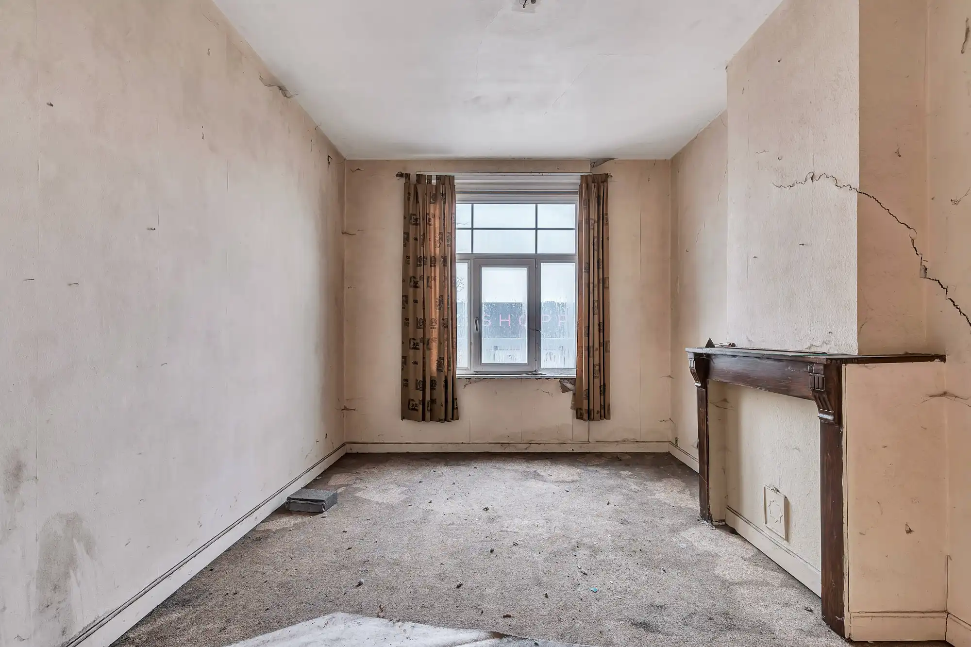 Volledig te renoveren handelspand met woonst op toplocatie foto 9