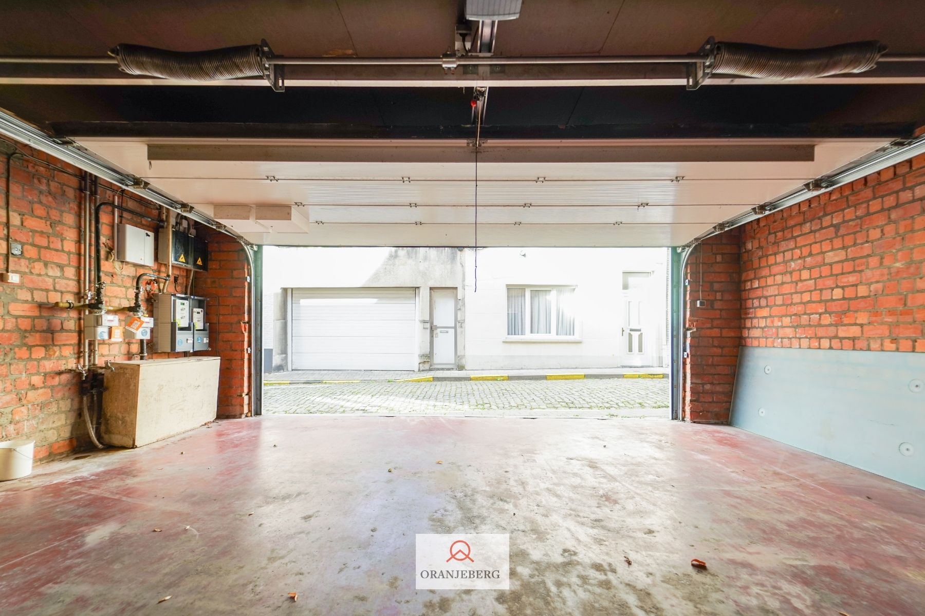 te huur : grote garage voor minimum 2 wagens foto 7