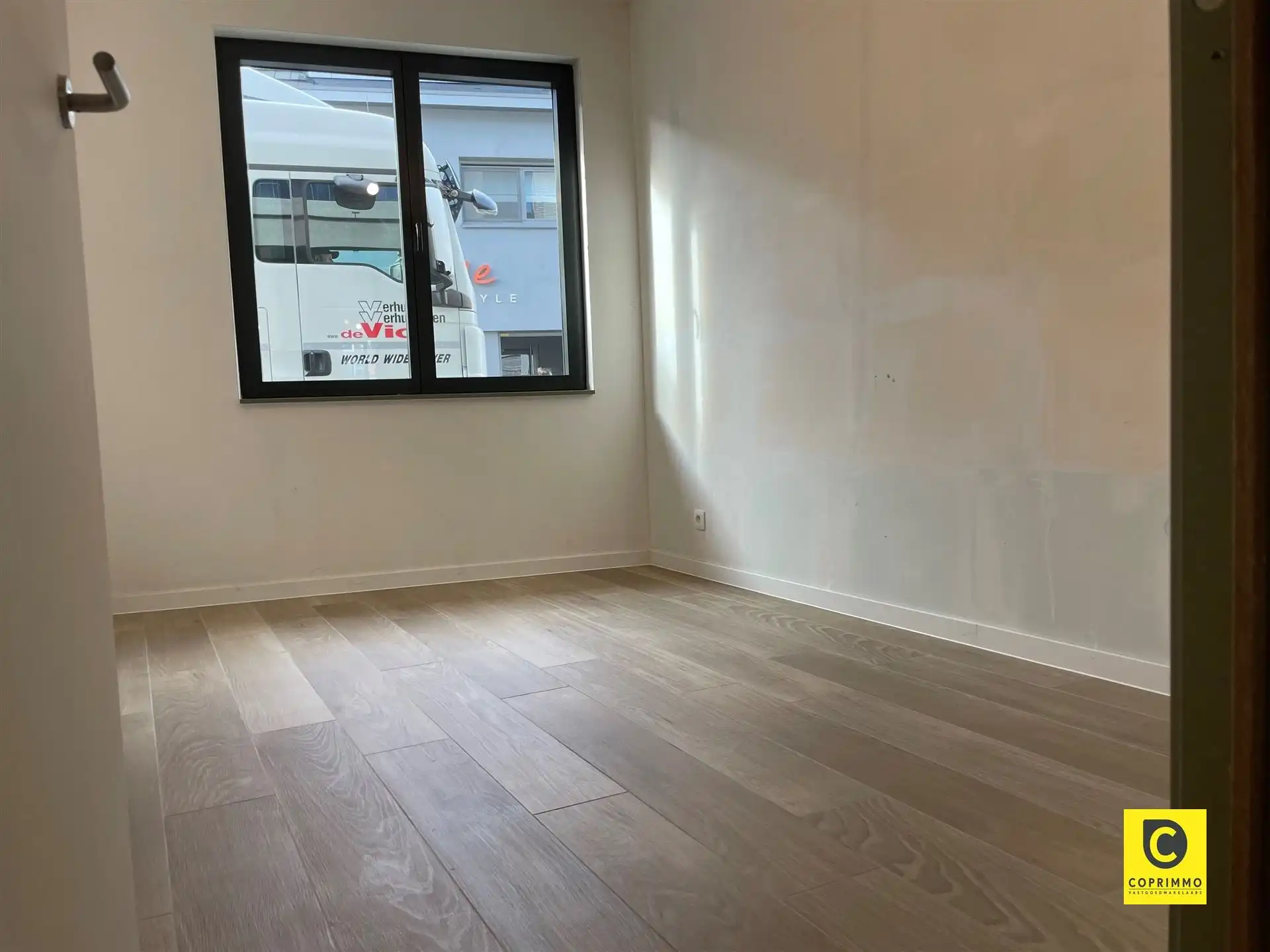 Gelijkvloers app. 2 slk. tuin en P  foto 6
