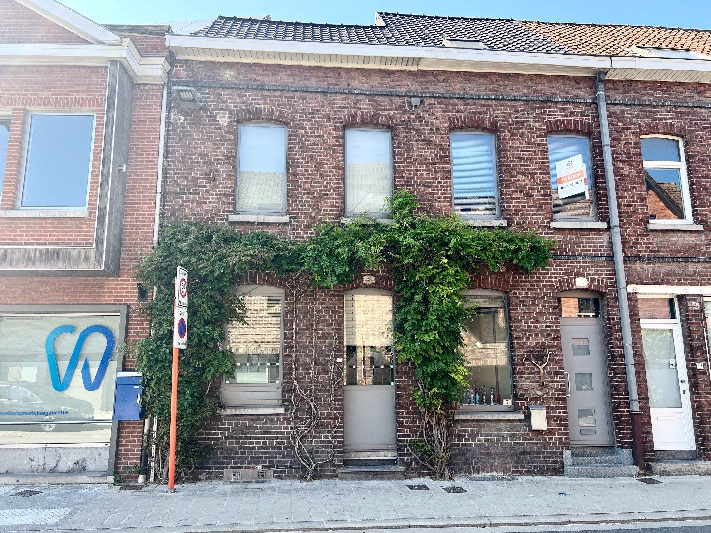 Kleurrijk, karaktervol en compleet uniek huis te koop pal in het centrum te Heule! foto 41