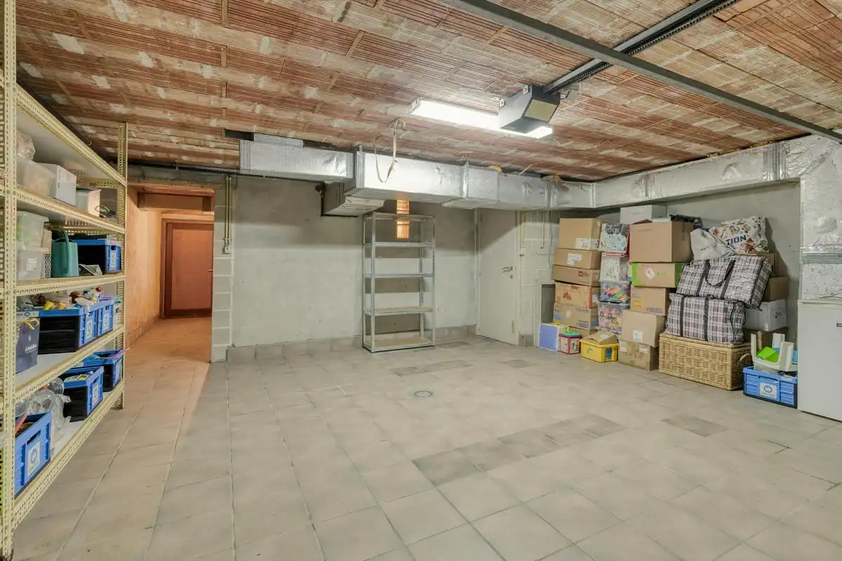 Uniek, lichtrijk huis te koop met speelse tussenniveaus  foto 35