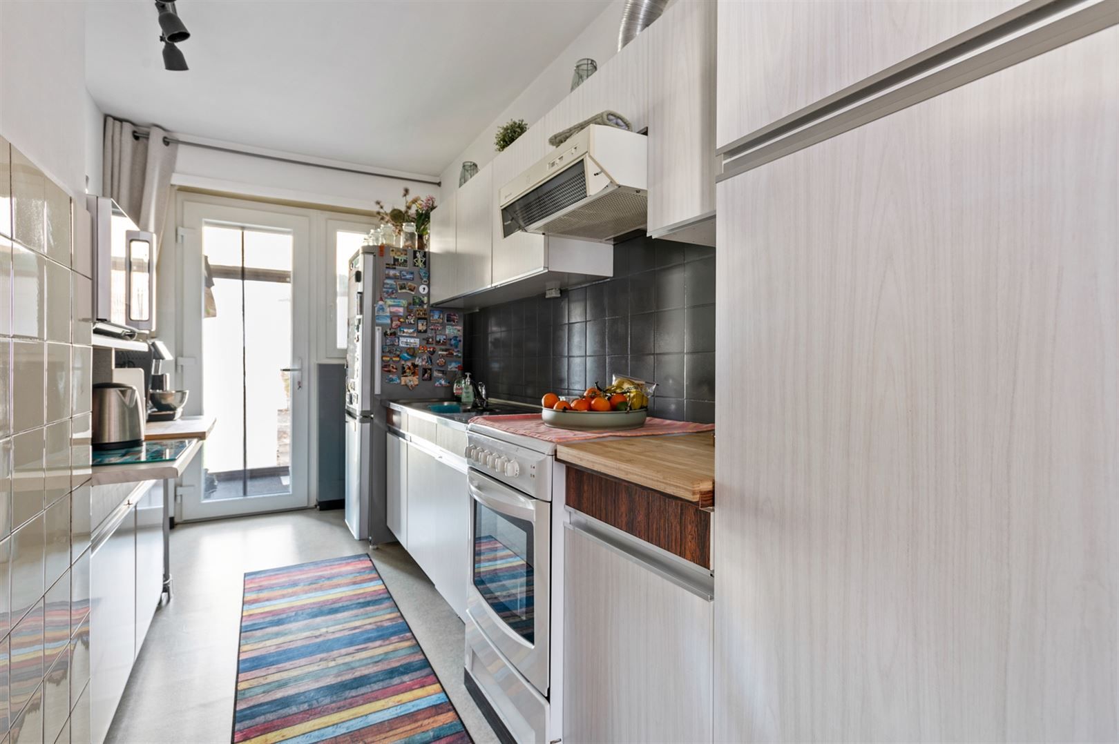 Rustig gelegen gelijkvloers appartement met 2 slaapkamers en garage. foto 7