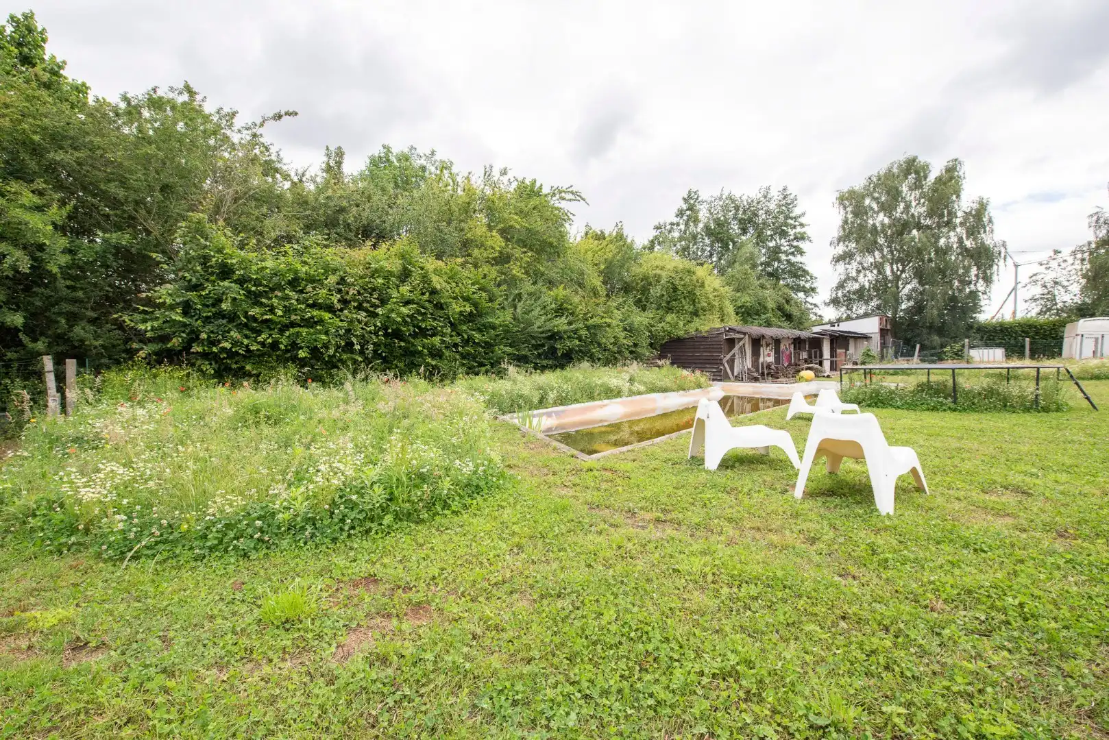 TE KOOP: Ruime architectenwoning in residentiële wijk 'De Piste'. Rustig, groen en zeer bereikbaar perceel van 1800m²! foto 24