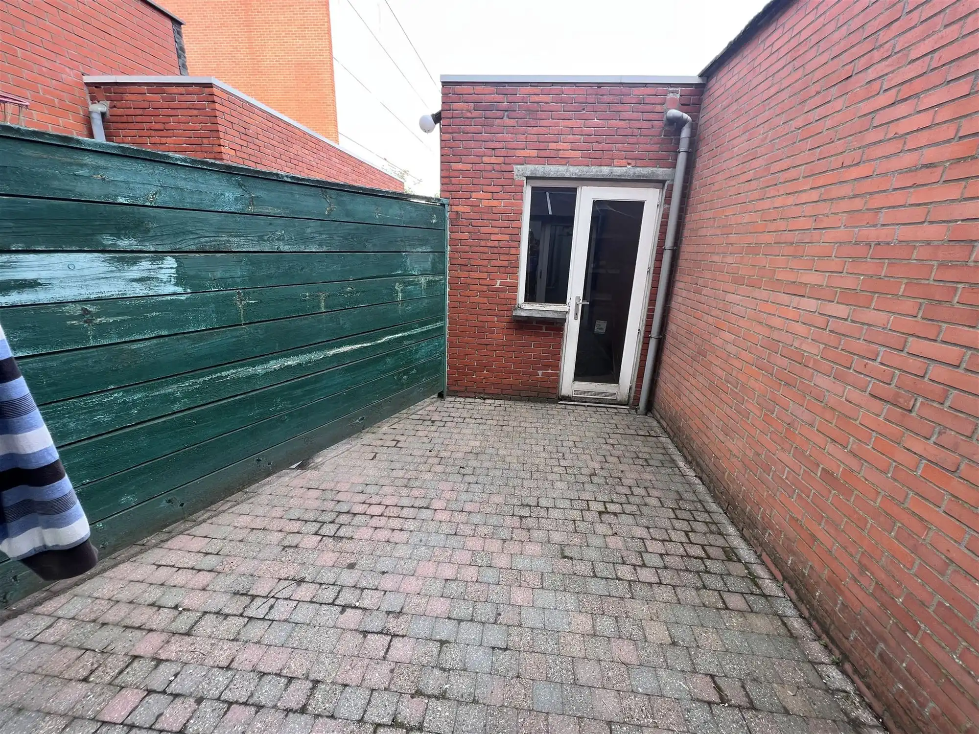 Opbrengsteigendom met 4 appartementen en tuin foto 23