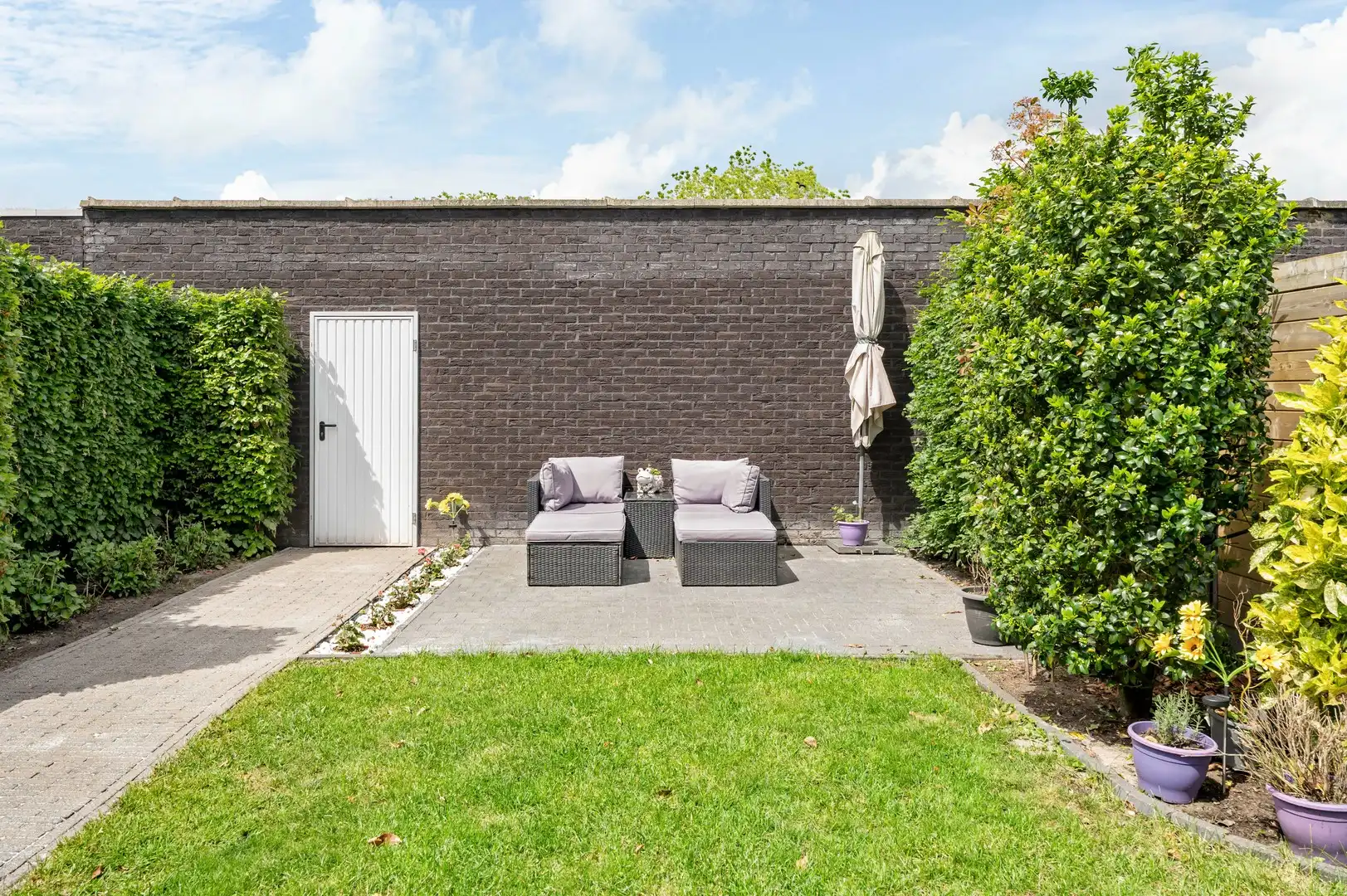 GLV-appartement Brasschaat met zonnige tuin en garage foto 15