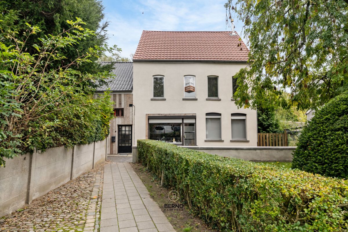 Hoofdfoto van de publicatie: Rustig gelegen woning met 3 slaapkamers en ruime garage.
