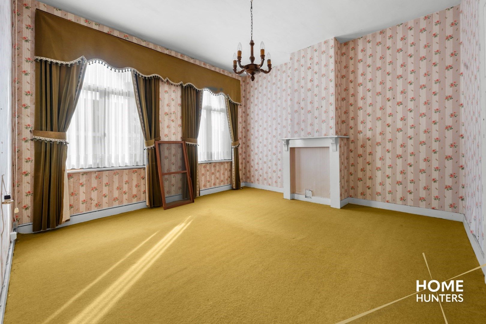 Authentiek herenhuis in Mesen – een renovatieparel met potentieel foto 13