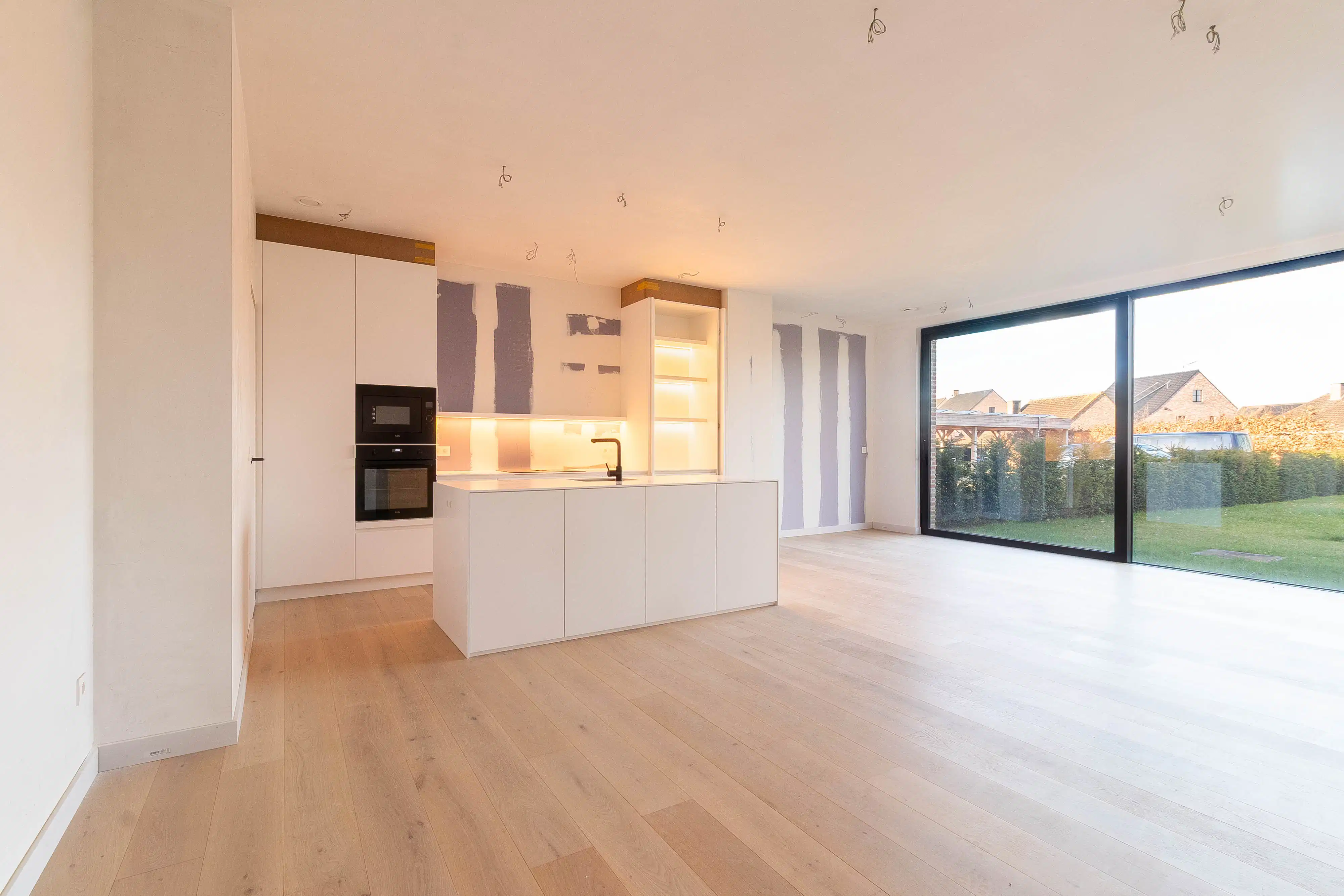 Hoogwaardig afgewerkt gelijkvloersappartement met tuin foto 2