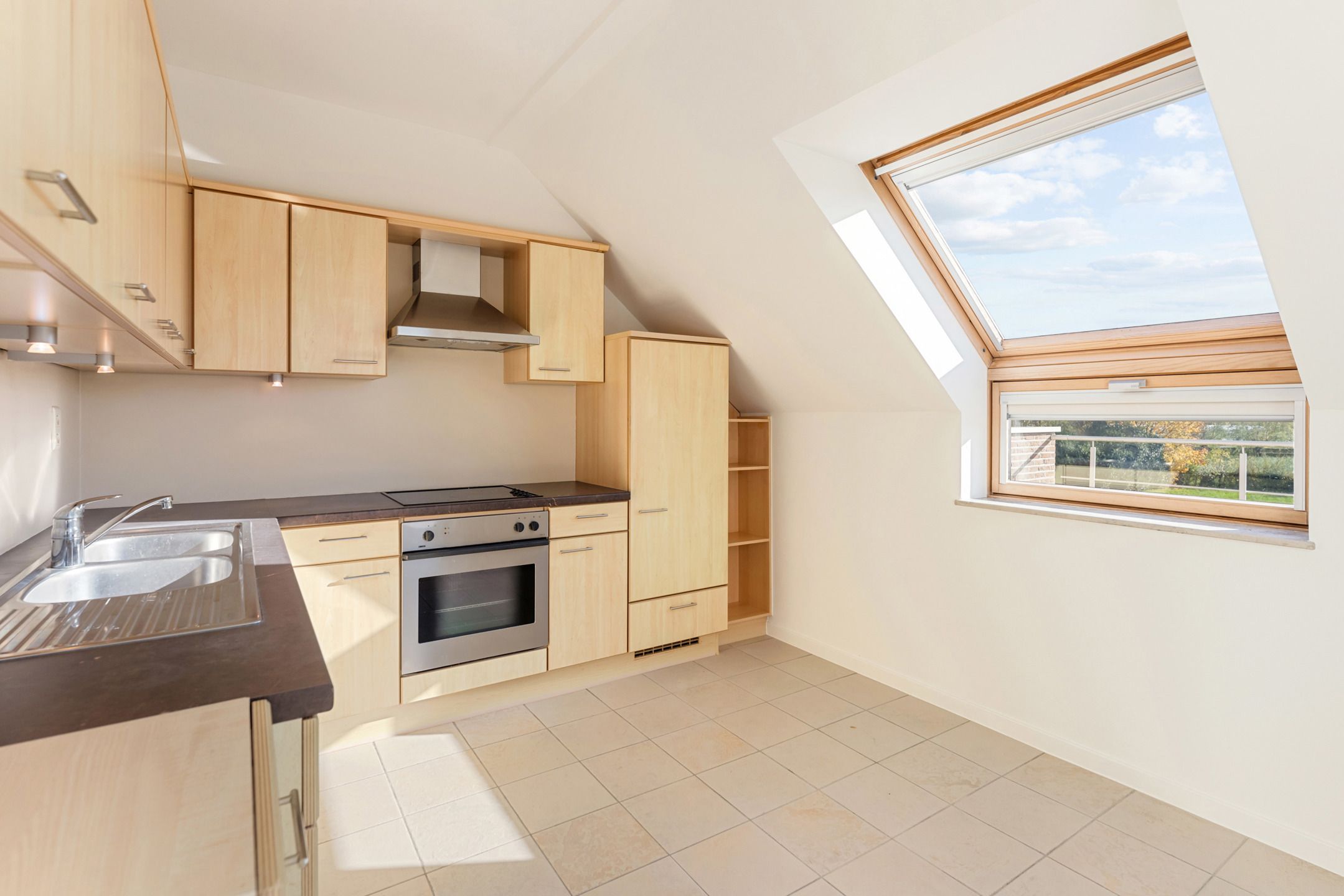 Duplex appartement met garage te Heukelom foto 12